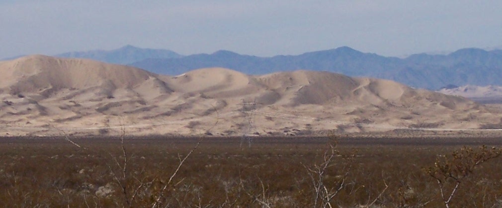 Mohave Reserve: sand dunes in the foreground, mountains in the background
